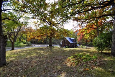 Nearly a half acre park-like wooded lot on a seclu