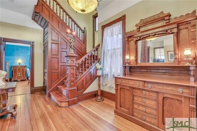 Entry foyer is magnificent. See the coffered stair