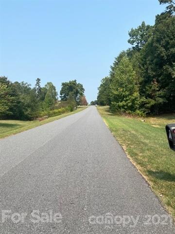 Approaching Lot 40, wooded area on right