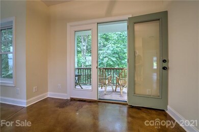 Living room opens to the private balcony