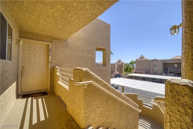 View of exterior entry featuring stucco siding
