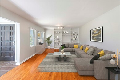 Living Room features built-in bookshelves and wood