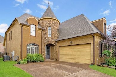 French provincial home featuring concrete driveway, a garage, roof with shingles, and brick siding