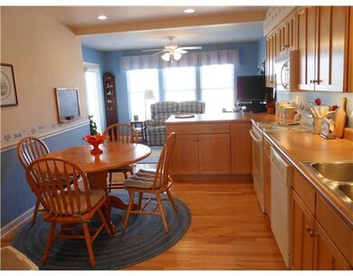 Kitchen. The eat-in kitchen also features chair ra
