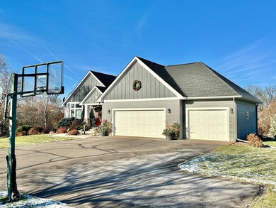 Lots of pavement for adequate parking and a bonus basketball court.