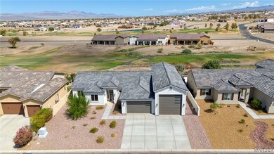 Birds eye view of property featuring a mountain vi