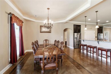 Enjoy views of the acreage from this gorgeous dini