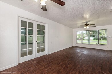 703 N Saint Clair Abrams Ave, Tavares, FL 32778 - photo 4