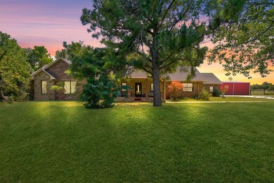 View of front facade with a lawn