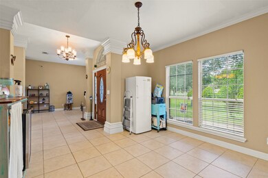 Flowing from the front entry to the kitchen, this