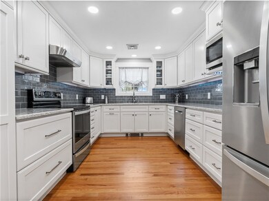 Custom kitchen with Quartz counter tops  loaded wi