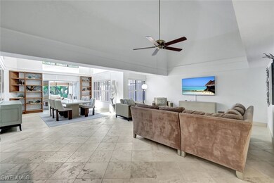 Living area featuring a ceiling fan