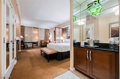Bedroom featuring french doors and ornamental mold