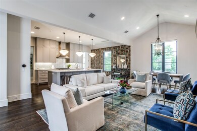 Living area overlooking dining and kitchen