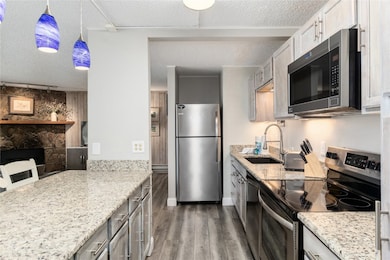 Updated kitchen with bar stool seating