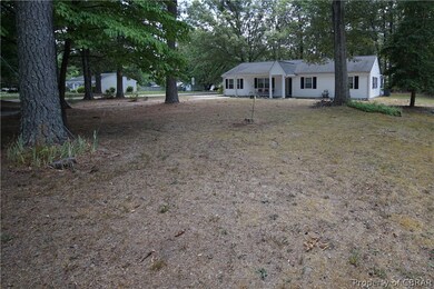 View of front of home featuring a front yard