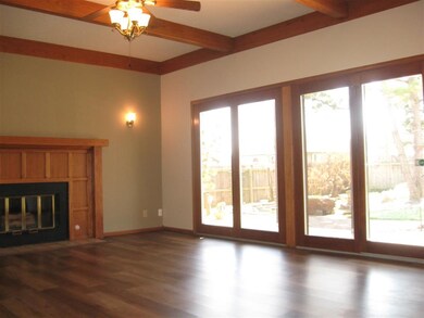 Wall of windows overlook backyard