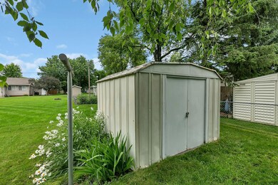 Accessory shed for yard equipment.