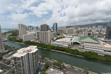 View of the city skyline with ocean views to the l
