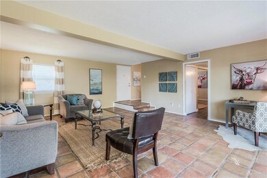 Open and bright, overlooks large covered patio and