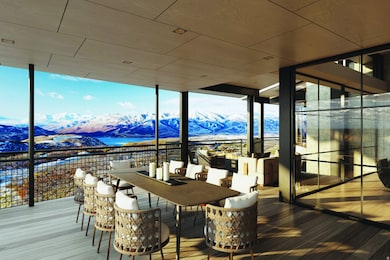 Wooden terrace featuring a mountain view