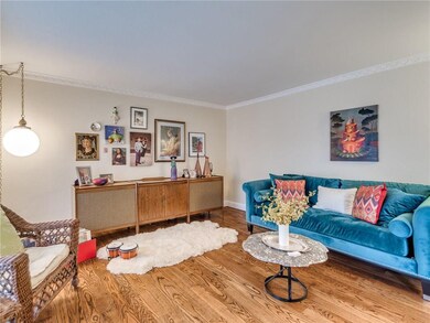 Formal living room with beautiful crown molding.
