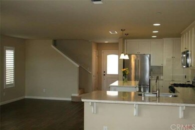 Kitchen from Nook w/ Family Room off Kitchen