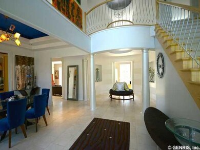 Foyer. A welcoming Foyer with Travertine floors an