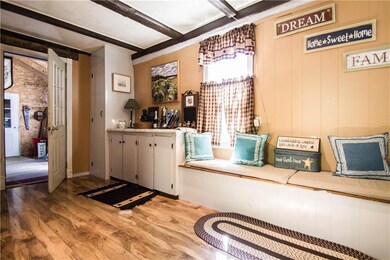 Leads to mus room and garage.