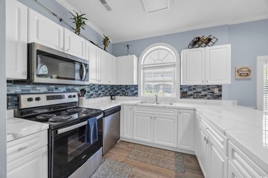 Kitchen featuring stainless steel appliances, visi
