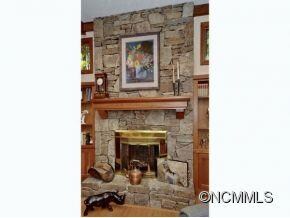 STONE FIREPLACE WITH GAS LOGS