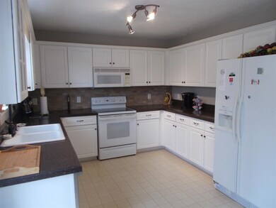 Nice bright kitchen.  Granite countertops.  