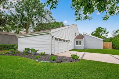 This photo showcases a modern, single-story home w