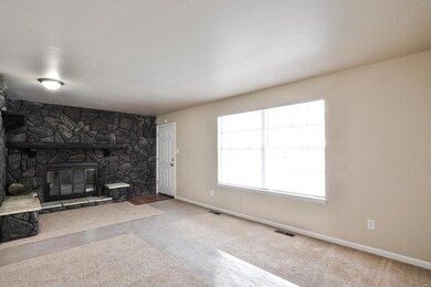 Radiant Living Room flaunts dual large windows for