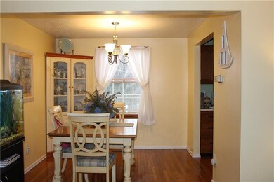 Spacious formal dining room showing entry to the k