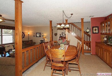Area dining is open to the kitchen and family room