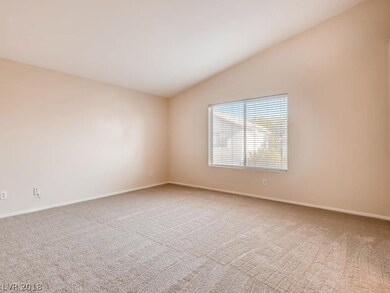 Master bedroom with vaulted ceiling