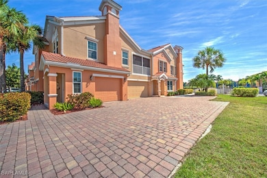 Large paver driveway, 2-car side-by-side garage an