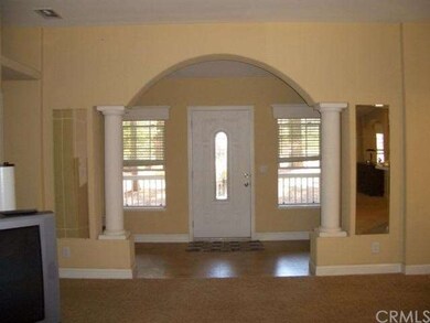 Grand foyer with pillars and archway