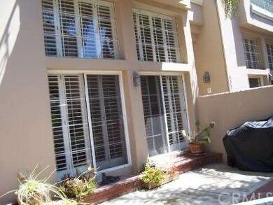 Sliders open to front patio