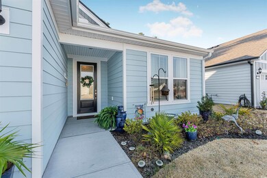 Doorway to property featuring a garage