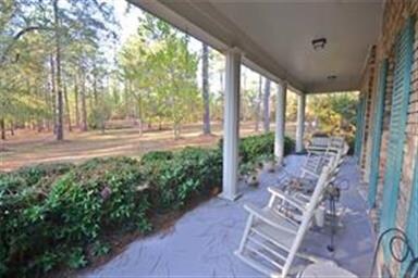Covered front porch with view to die for!