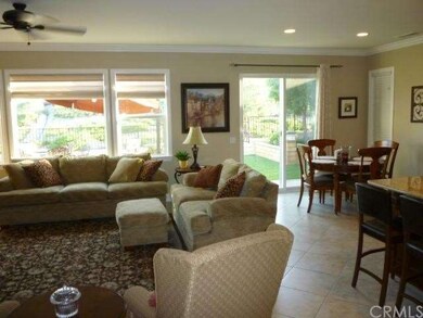 Small dining area overlooking backyard and island 