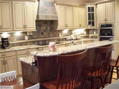 Kitchen. Counters have under counter lighting.