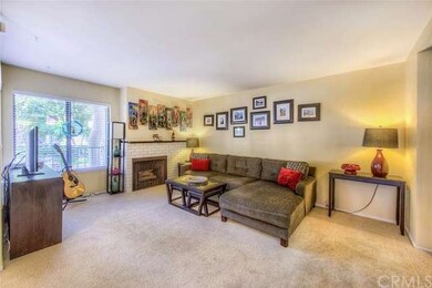 Relax in front of the fireplace in the living room