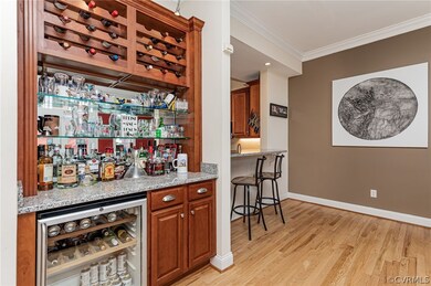 bar area with mini fridge