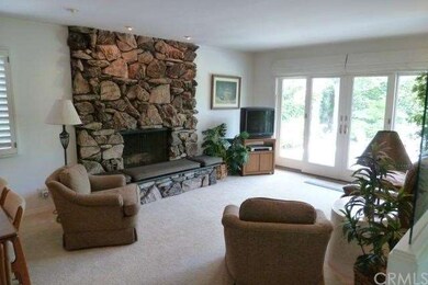 Family Room Looking Out To Rear Yard & Covered Pat