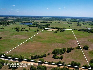 Drone / aerial view with a rural view and a water 