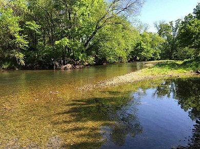 View. Creek that the lot backs up to. Very Peaceful!