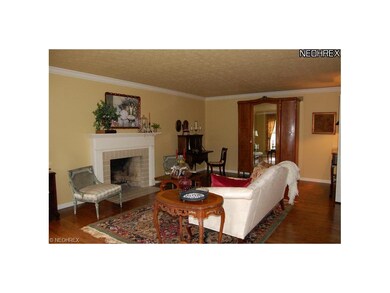 The formal living room, to the left of the foyer, 